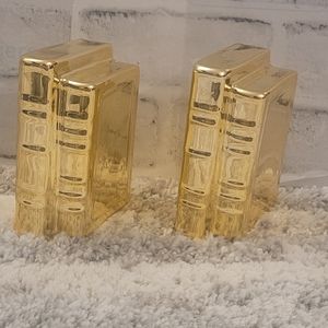 2 books, gold ceramic figures
